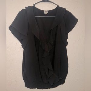 NWOT. Black top with flowy ruffle detail down the front. V neck. Size medium